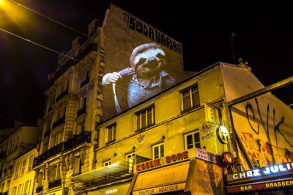 SAFARI URBAINPARISIAN WILDLIFE                              SAFARI URBAIN est une série de photographies représentant des portraits d’animaux re-lookés, projetés sur les façades et les bâtiments Paris.L’artiste nous invite à une déambulation nocturne, où, au détour d’une ruelle, vous tomberez peut-être, nez-à-nez avec un guépard affublé d’un bombers.                                                                                                                           L'AIGLE DU MONT-CENIS, PARIS - 2015 © Julien NONNON                                                                                          LE CERF DE BECQUEREL, PARIS - 2015 © Julien NONNON                                                                                          LA BICHE ET L'OURANG OUTAN, PARIS - 2015 © Julien NONNON                                                                                        LES CHIENS DE DOUDEAUVILLE, PARIS - 2015 © Julien NONNON                                                                             LE PARESSEUX DE LEPIC, PARIS - 2015 © Julien NONNON                                                                             LE BULLDOG DE CLICHY, PARIS - 2015 © Julien NONNON                                                                             LE CHATON DE COUSTOU, PARIS - 2015 © Julien NONNON                                                                             LE CROCODILE DE LA CIGALE, PARIS - 2015 © Julien NONNON                                                                             LE BERGER DE CLIGNANCOURT, PARIS - 2015 © Julien NONNON                                                                             LE KOALA DE LOWENDAL, PARIS - 2015 © Julien NONNON                                                                             LE GUEPARD DELA PLACE DU TERTRE, PARIS - 2015 © Julien NONNON                                                                             LE LÉMURIEN DE MONTMARTRE, PARIS - 2015 © Julien NONNON                                                                             LE BUFFLE DE LA CHAPELLE, PARIS - 2015 © Julien NONNON                                                                             LA HYÈNE D'EUPATORIA, PARIS - 2015 © Julien NONNON                                                                             LE LOUP DE BOREY, PARIS - 2015 © Julien NONNON                                                                             LE TIGRE DES AMANDIERS, PARIS - 2015 © Julien NONNON
