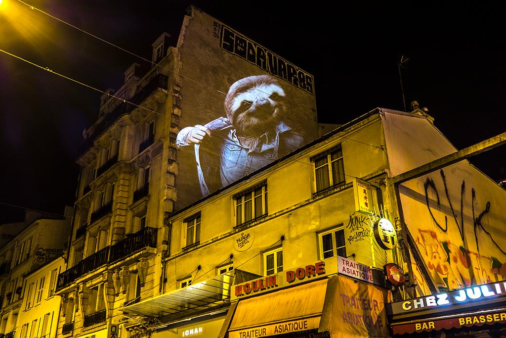 SAFARI URBAINPARISIAN WILDLIFE SAFARI URBAIN est une série de photographies représentant des portraits d’animaux re-lookés, projetés sur les façades et les bâtiments Paris.L’artiste nous invite à une déambulation nocturne, où, au détour d’une ruelle, vous tomberez peut-être, nez-à-nez avec un guépard affublé d’un bombers. L'AIGLE DU MONT-CENIS, PARIS - 2015 © Julien NONNON LE CERF DE BECQUEREL, PARIS - 2015 © Julien NONNON LA BICHE ET L'OURANG OUTAN, PARIS - 2015 © Julien NONNON LES CHIENS DE DOUDEAUVILLE, PARIS - 2015 © Julien NONNON LE PARESSEUX DE LEPIC, PARIS - 2015 © Julien NONNON LE BULLDOG DE CLICHY, PARIS - 2015 © Julien NONNON LE CHATON DE COUSTOU, PARIS - 2015 © Julien NONNON LE CROCODILE DE LA CIGALE, PARIS - 2015 © Julien NONNON LE BERGER DE CLIGNANCOURT, PARIS - 2015 © Julien NONNON LE KOALA DE LOWENDAL, PARIS - 2015 © Julien NONNON LE GUEPARD DELA PLACE DU TERTRE, PARIS - 2015 © Julien NONNON LE LÉMURIEN DE MONTMARTRE, PARIS - 2015 © Julien NONNON LE BUFFLE DE LA CHAPELLE, PARIS - 2015 © Julien NONNON LA HYÈNE D'EUPATORIA, PARIS - 2015 © Julien NONNON LE LOUP DE BOREY, PARIS - 2015 © Julien NONNON LE TIGRE DES AMANDIERS, PARIS - 2015 © Julien NONNON SAFARI URBAINPARISIAN WILDLIFE SAFARI URBAIN est une série de photographies représentant des portraits d’animaux re-lookés, projetés sur les façades et les bâtiments Paris.L’artiste nous invite à une déambulation nocturne, où, au détour d’une ruelle, vous tomberez peut-être, nez-à-nez avec un guépard affublé d’un bombers. L'AIGLE DU MONT-CENIS, PARIS - 2015 © Julien NONNON LE CERF DE BECQUEREL, PARIS - 2015 © Julien NONNON LA BICHE ET L'OURANG OUTAN, PARIS - 2015 © Julien NONNON LES CHIENS DE DOUDEAUVILLE, PARIS - 2015 © Julien NONNON LE PARESSEUX DE LEPIC, PARIS - 2015 © Julien NONNON LE BULLDOG DE CLICHY, PARIS - 2015 © Julien NONNON LE CHATON DE COUSTOU, PARIS - 2015 © Julien NONNON LE CROCODILE DE LA CIGALE, PARIS - 2015 © Julien NONNON LE BERGER DE CLIGNANCOURT, PARIS - 2015 © Julien NONNON LE KOALA DE LOWENDAL, PARIS - 2015 © Julien NONNON LE GUEPARD DELA PLACE DU TERTRE, PARIS - 2015 © Julien NONNON LE LÉMURIEN DE MONTMARTRE, PARIS - 2015 © Julien NONNON LE BUFFLE DE LA CHAPELLE, PARIS - 2015 © Julien NONNON LA HYÈNE D'EUPATORIA, PARIS - 2015 © Julien NONNON LE LOUP DE BOREY, PARIS - 2015 © Julien NONNON LE TIGRE DES AMANDIERS, PARIS - 2015 © Julien NONNON
